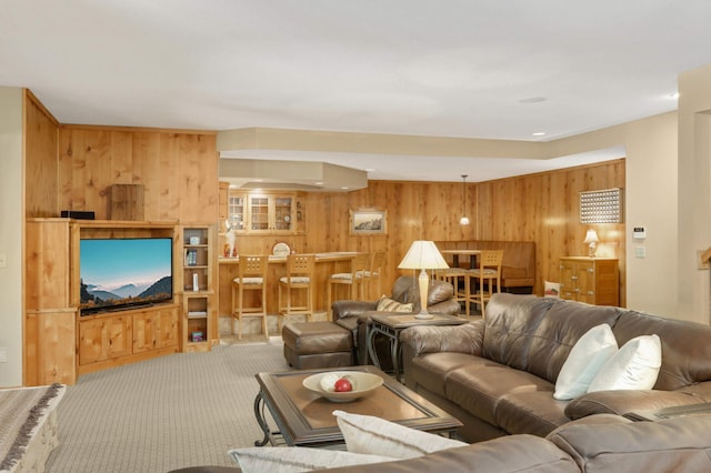 6209 Heather Pl NE, Fridley, MN 55432 - living room with wooden walls and carpet floors