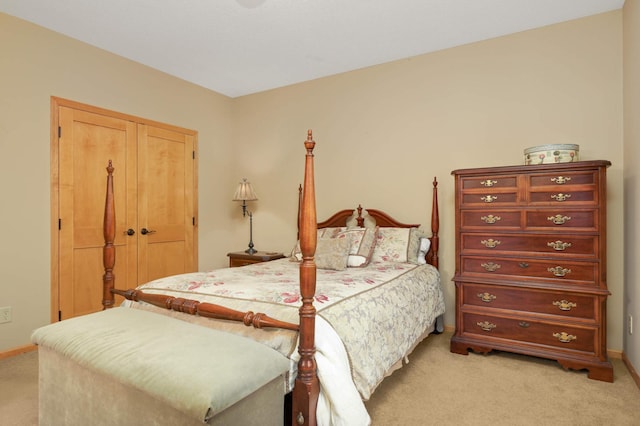 6209 Heather Pl NE, Fridley, MN 55432 - bedroom featuring light carpet, baseboards, and a closet
