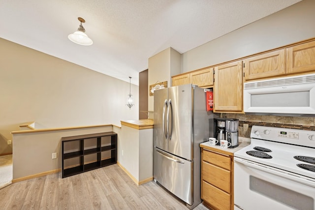 8260 Parkington Ave NE, Otsego, MN 55330 - kitchen featuring white appliances, light wood-style flooring, light brown cabinets, light countertops, and baseboards
