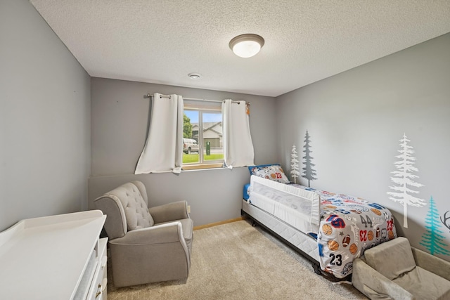 8260 Parkington Ave NE, Otsego, MN 55330 - carpeted bedroom with baseboards and a textured ceiling