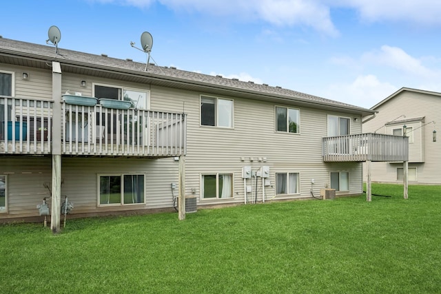 8260 Parkington Ave NE, Otsego, MN 55330 - rear view of property with a lawn, central AC, and a wooden deck
