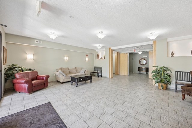 community lobby featuring a textured ceiling