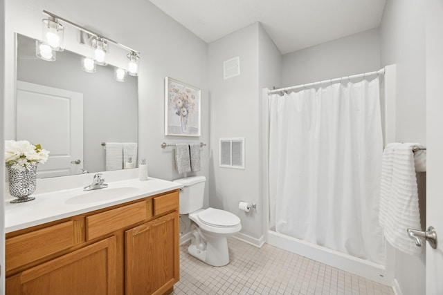 bathroom featuring tile patterned floors, toilet, a stall shower, vanity, and baseboards