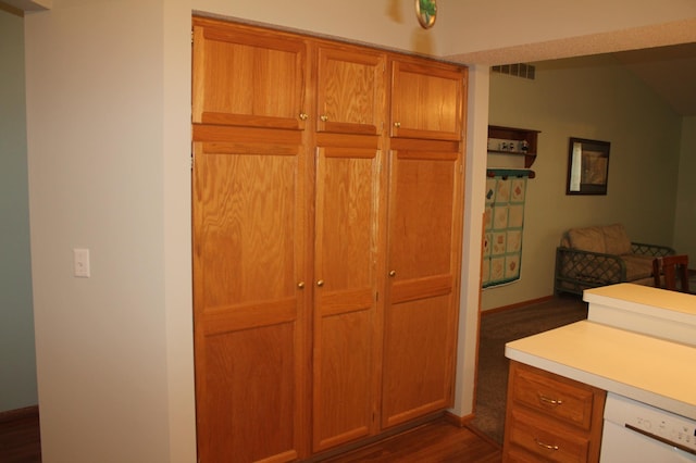 office space with baseboards and dark wood-style floors