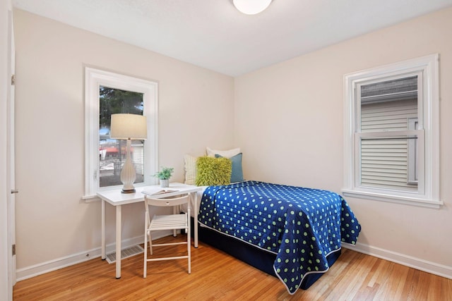 1650 Sherburne Ave, Saint Paul, MN 55104 - bedroom featuring wood finished floors and baseboards
