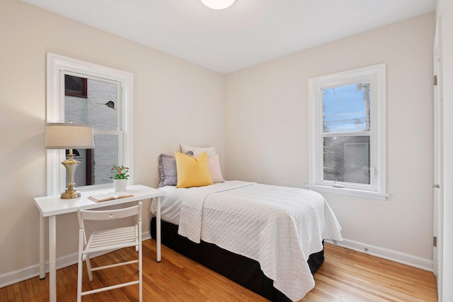 1650 Sherburne Ave, Saint Paul, MN 55104 - bedroom featuring baseboards and wood finished floors