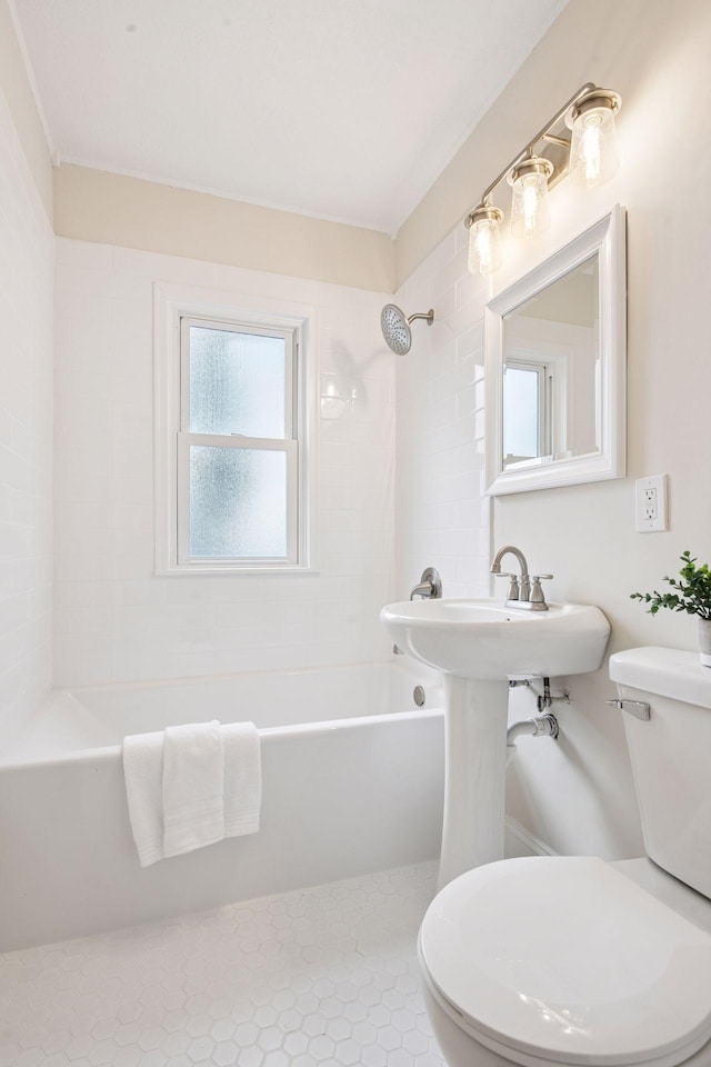1650 Sherburne Ave, Saint Paul, MN 55104 - bathroom featuring toilet and shower / bathtub combination