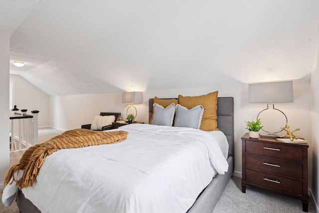 1650 Sherburne Ave, Saint Paul, MN 55104 - bedroom featuring light colored carpet, lofted ceiling, and baseboards