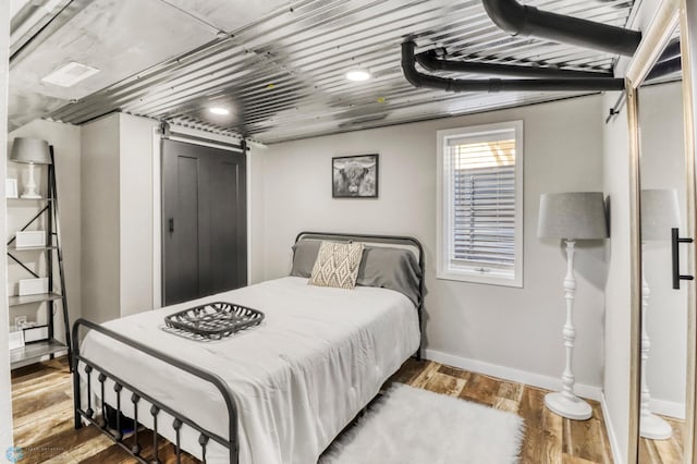 101 5th St NE, Barnesville, MN 56514 - bedroom featuring wood finished floors and baseboards