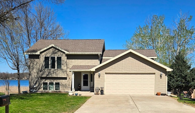 1900 White Cloud Dr E, Isle, MN 56342 - split level home with a garage, driveway, a front yard, roof with shingles, and a water view