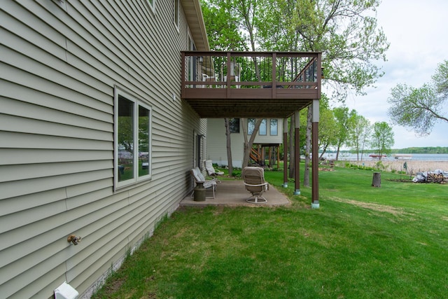 1900 White Cloud Dr E, Isle, MN 56342 - view of green lawn featuring a patio and a wooden deck