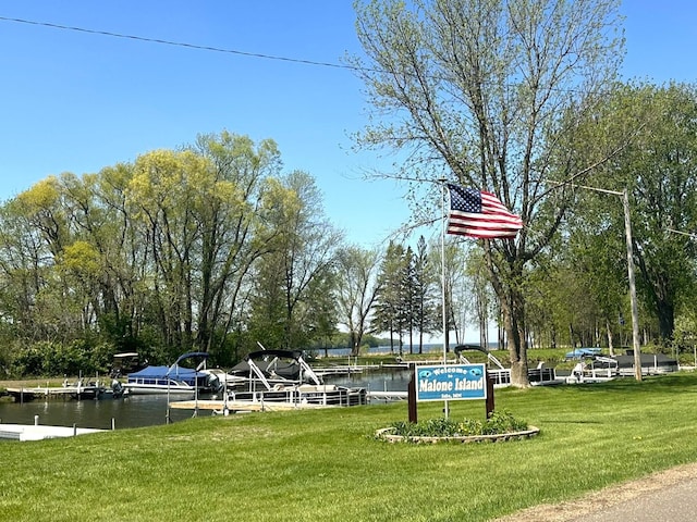 1900 White Cloud Dr E, Isle, MN 56342 - view of home's community with a lawn and a water view