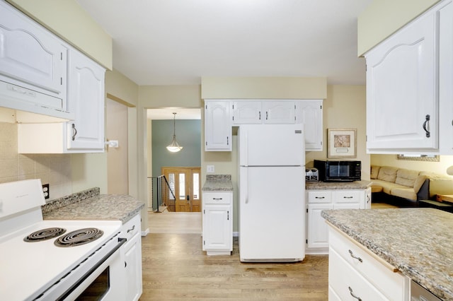 W12798 State Road 35, Prescott, WI 54021 - kitchen with white appliances, light wood-style flooring, light countertops, and white cabinetry