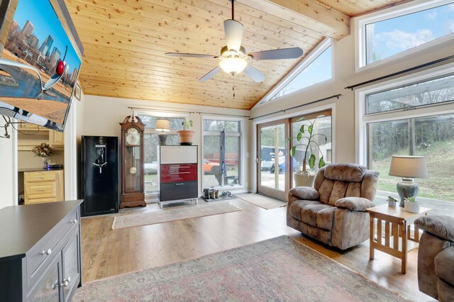 W12798 State Road 35, Prescott, WI 54021 - living room with wooden ceiling, light wood finished floors, ceiling fan, beamed ceiling, and high vaulted ceiling
