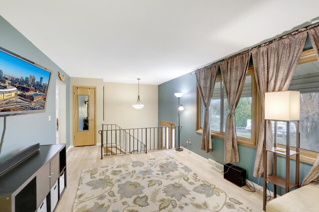 W12798 State Road 35, Prescott, WI 54021 - living area featuring wood finished floors and baseboards