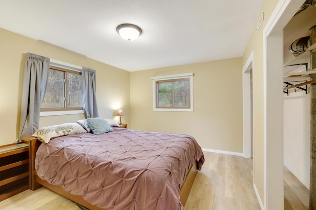 W12798 State Road 35, Prescott, WI 54021 - bedroom with wood finished floors and baseboards