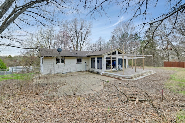 W12798 State Road 35, Prescott, WI 54021 - rear view of house with a patio, fence, and crawl space