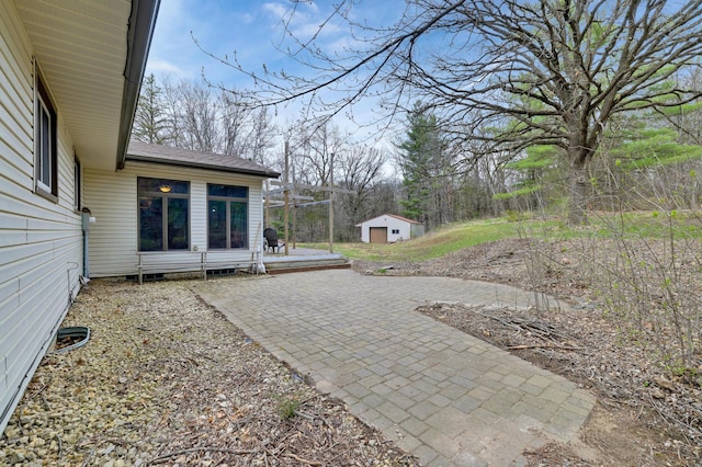 W12798 State Road 35, Prescott, WI 54021 - view of yard with an outdoor structure and a patio
