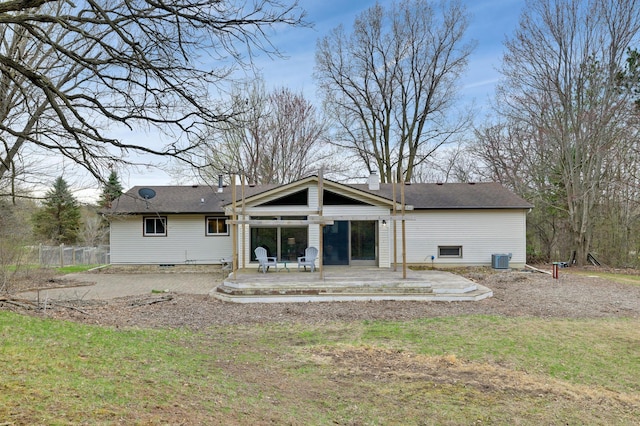 W12798 State Road 35, Prescott, WI 54021 - rear view of house with a chimney, a deck, and cooling unit