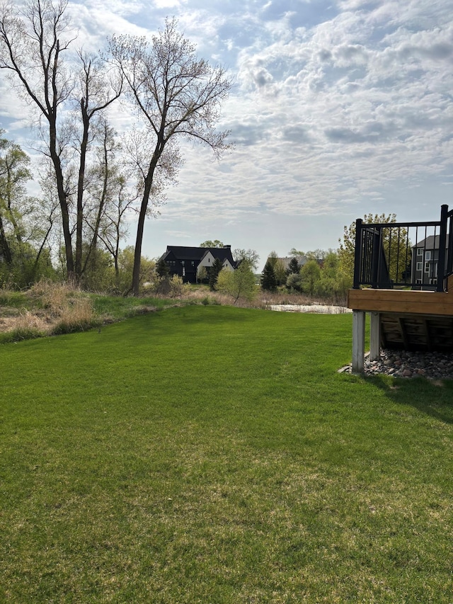 3742 Crane Island Ct, Minnetrista, MN 55331 - view of grassy yard featuring a deck