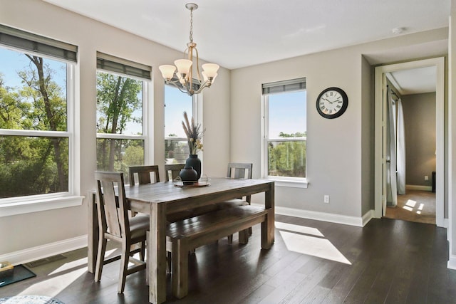 3742 Crane Island Ct, Minnetrista, MN 55331 - dining room with healthy amount of natural light, baseboards, a chandelier, and dark wood-style flooring