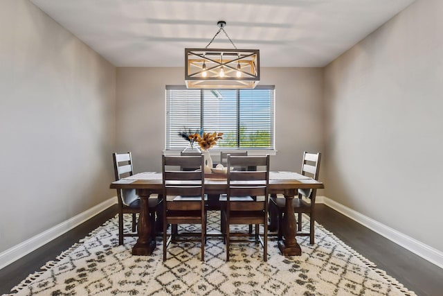3742 Crane Island Ct, Minnetrista, MN 55331 - dining room featuring wood finished floors, baseboards, and a chandelier