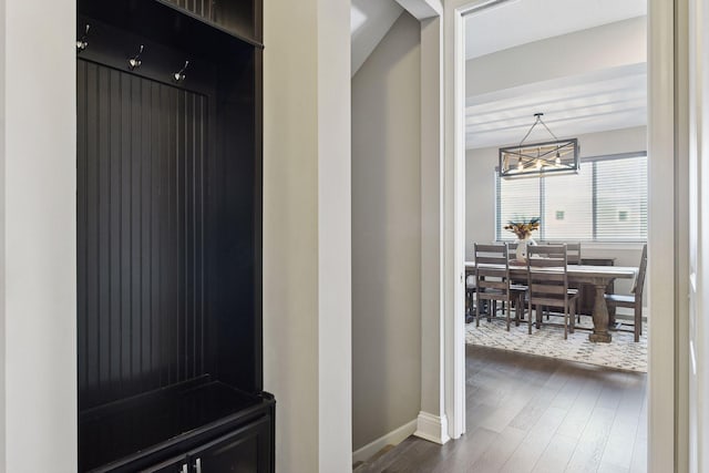 3742 Crane Island Ct, Minnetrista, MN 55331 - mudroom featuring a chandelier, dark wood-style floors, and baseboards