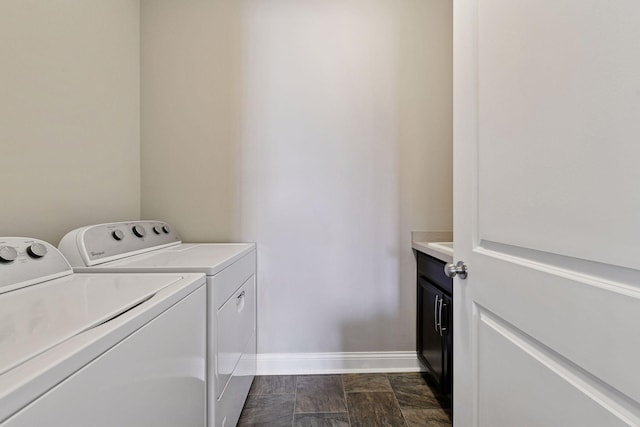 3742 Crane Island Ct, Minnetrista, MN 55331 - washroom featuring separate washer and dryer, cabinet space, and baseboards