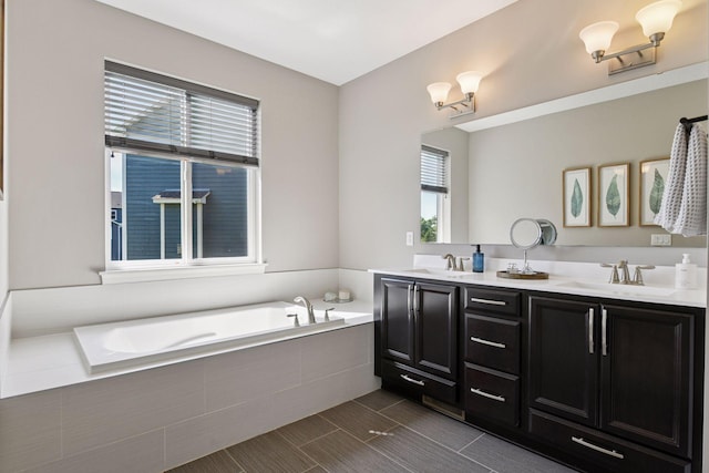 3742 Crane Island Ct, Minnetrista, MN 55331 - full bathroom featuring healthy amount of natural light, double vanity, and a garden tub