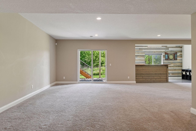 3742 Crane Island Ct, Minnetrista, MN 55331 - spare room with carpet, baseboards, recessed lighting, and a textured ceiling