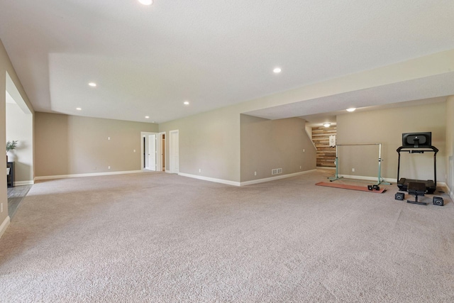 3742 Crane Island Ct, Minnetrista, MN 55331 - unfurnished living room with carpet flooring, baseboards, stairway, and recessed lighting