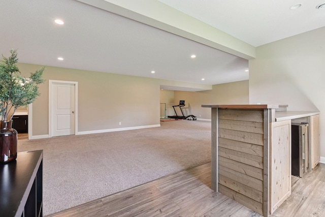 3742 Crane Island Ct, Minnetrista, MN 55331 - kitchen featuring baseboards, light wood-style flooring, recessed lighting, light carpet, and light countertops