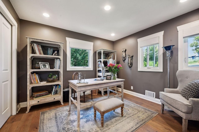 office area with wood finished floors, baseboards, and recessed lighting
