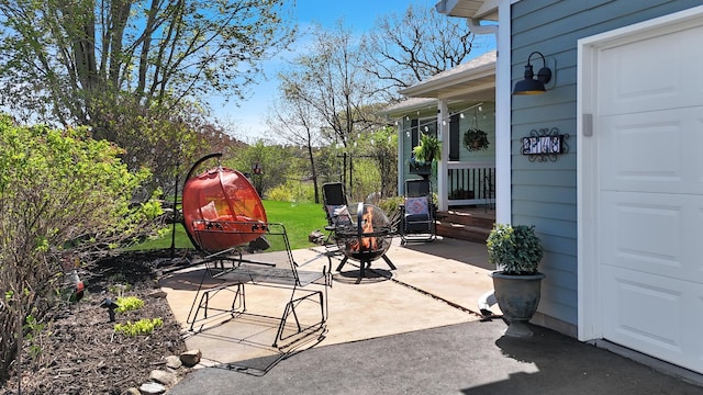 view of patio / terrace with a garage