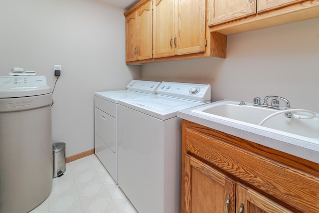 17081 Pheasant Meadow Ln SW, Prior Lake, MN 55372 - clothes washing area featuring washer and dryer, cabinet space, and light flooring