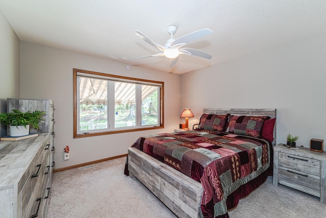 17081 Pheasant Meadow Ln SW, Prior Lake, MN 55372 - bedroom with light colored carpet, baseboards, and a ceiling fan