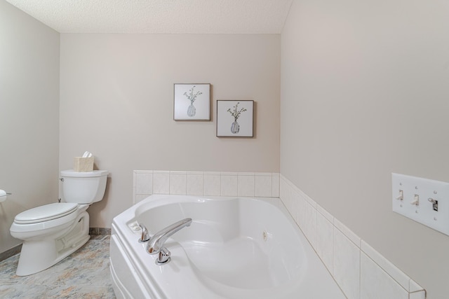 17081 Pheasant Meadow Ln SW, Prior Lake, MN 55372 - full bath with toilet, a garden tub, and a textured ceiling