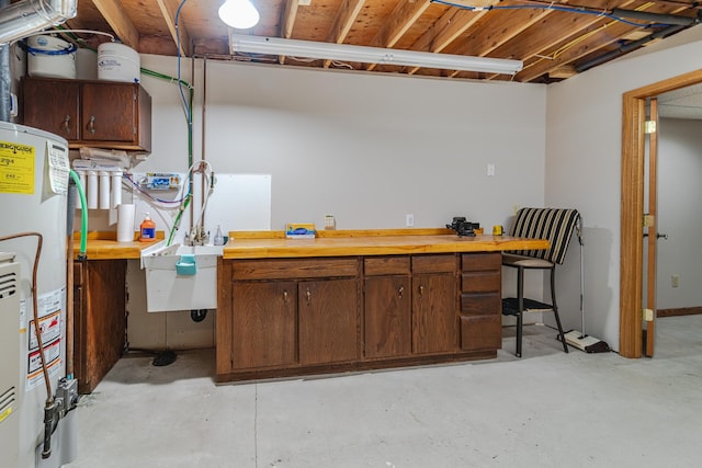 17081 Pheasant Meadow Ln SW, Prior Lake, MN 55372 - basement featuring water heater and a workshop area
