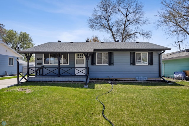 view of front of home with a front yard, a porch, and roof with shingles