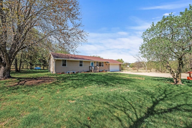7349 Variolite Dr NW, Stanford Twp, MN 55398 - back of property with driveway, an attached garage, and a yard