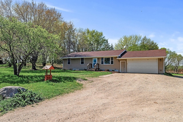 7349 Variolite Dr NW, Stanford Twp, MN 55398 - ranch-style home featuring dirt driveway, a garage, and a front lawn