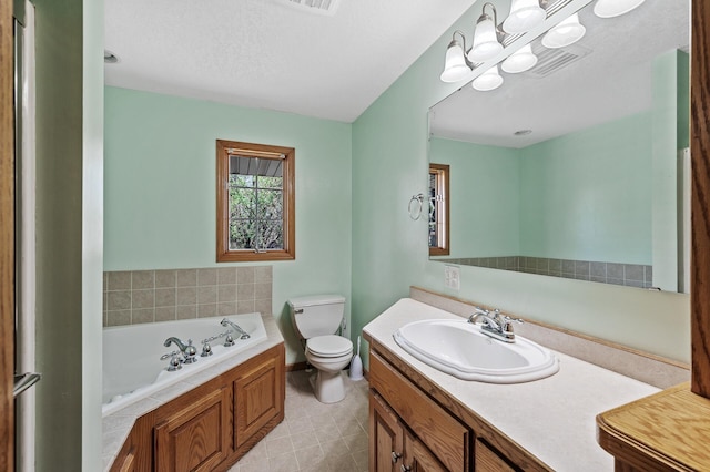 7349 Variolite Dr NW, Stanford Twp, MN 55398 - full bath with a bath, toilet, vanity, and tile patterned flooring
