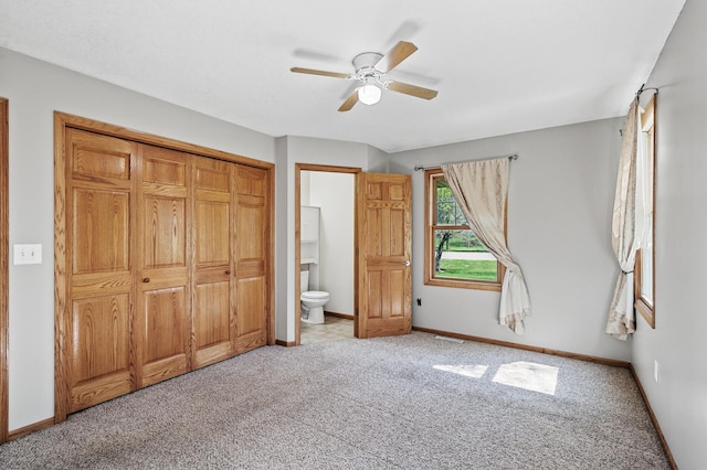 7349 Variolite Dr NW, Stanford Twp, MN 55398 - unfurnished bedroom with carpet, baseboards, and ceiling fan