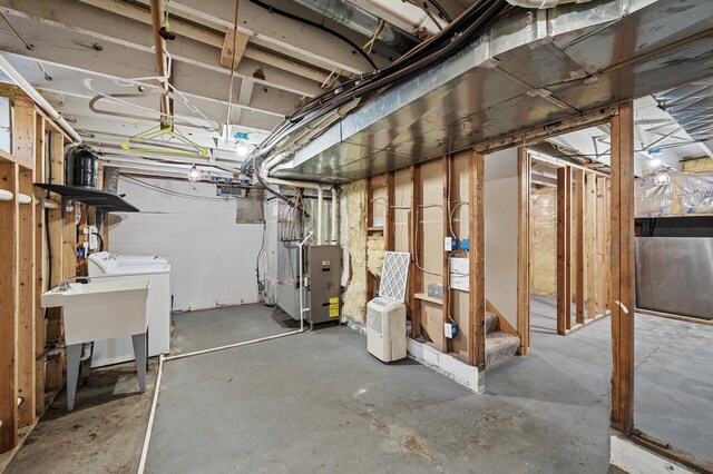 7349 Variolite Dr NW, Stanford Twp, MN 55398 - unfinished basement with washing machine and dryer and heating unit