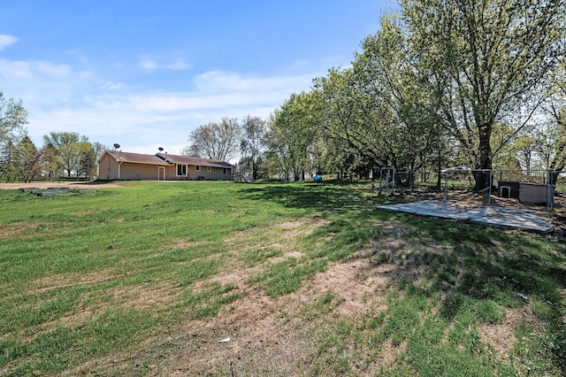 7349 Variolite Dr NW, Stanford Twp, MN 55398 - view of green lawn with a patio