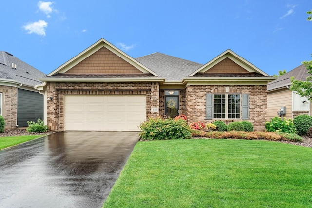 8713 9th Pl N, Lake Elmo, MN 55042 - view of front of property with asphalt driveway, brick siding, a front lawn, a garage, and a shingled roof
