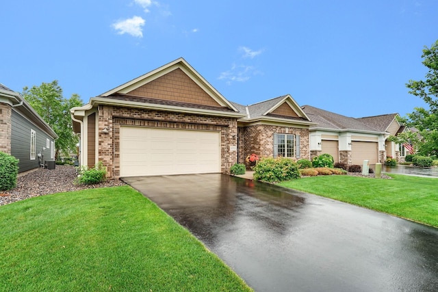 8713 9th Pl N, Lake Elmo, MN 55042 - view of front facade with driveway, an attached garage, brick siding, and a front yard