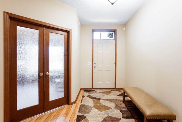 8713 9th Pl N, Lake Elmo, MN 55042 - foyer with french doors and inlaid floor details