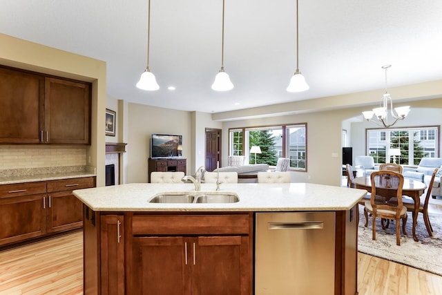 8713 9th Pl N, Lake Elmo, MN 55042 - kitchen with open floor plan, dishwasher, light wood-type flooring, a chandelier, and recessed lighting