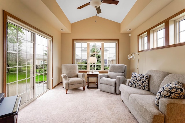 8713 9th Pl N, Lake Elmo, MN 55042 - living area featuring vaulted ceiling, light carpet, and ceiling fan